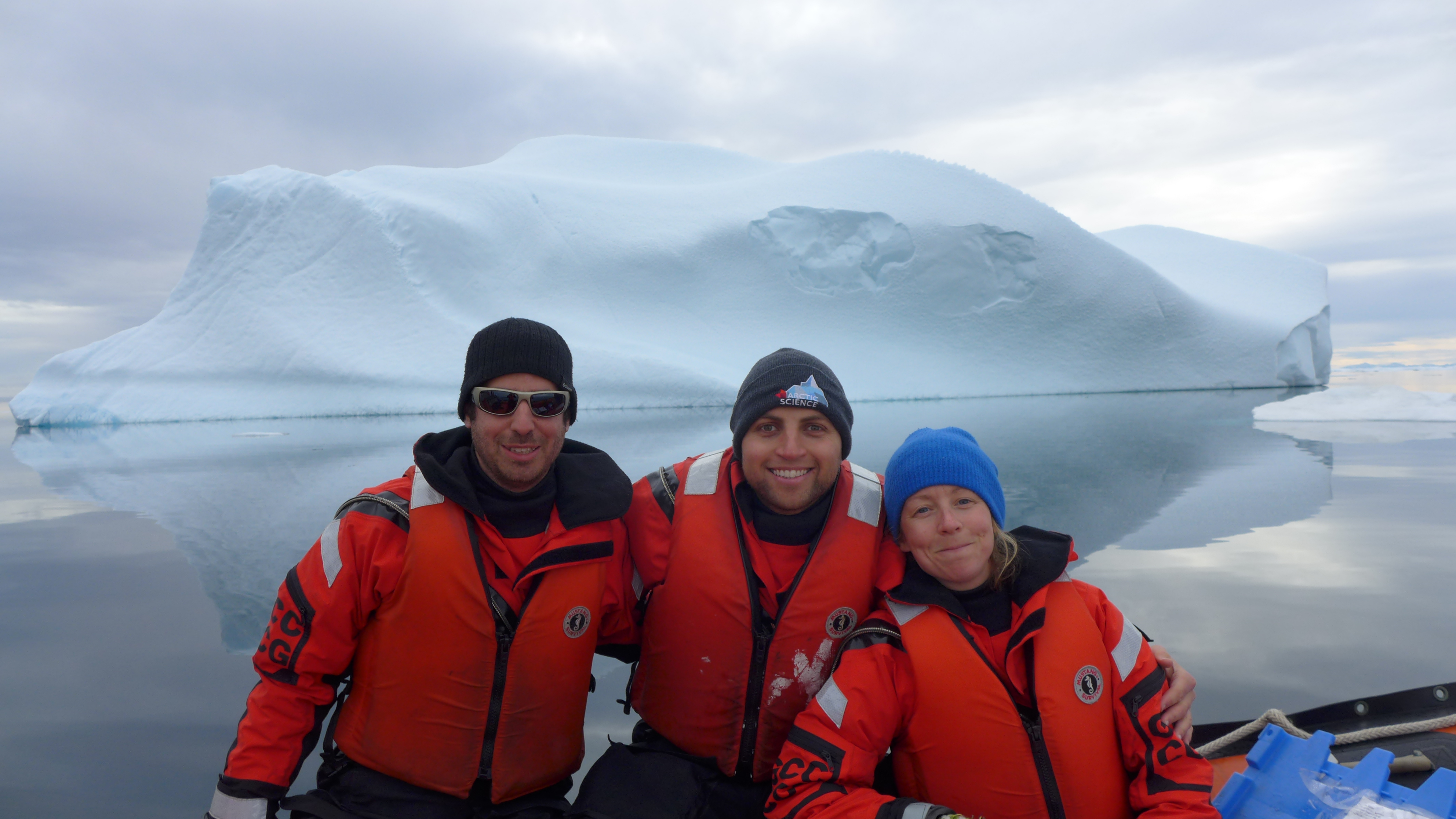 Iceberg and Arctic water during scientific fieldwork.